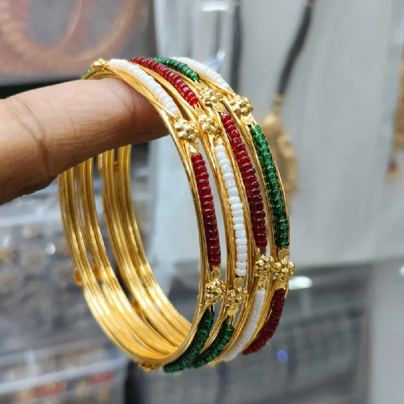 women’s engraved bracelets-Pooja Bangles Gold Plated Beads Bangle Set